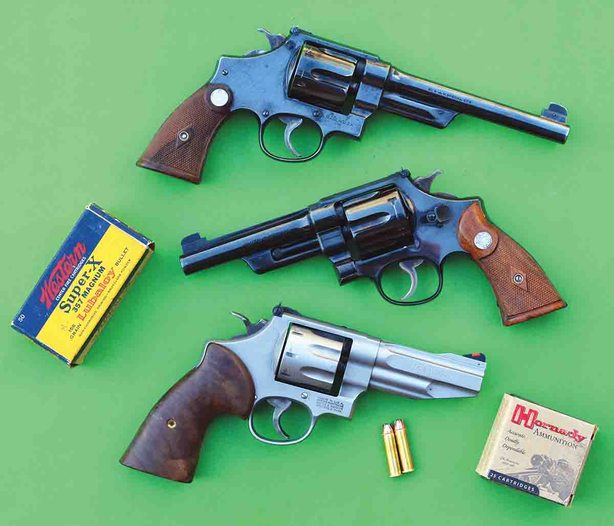 The modern Smith & Wesson Model 627 .357 Magnum (bottom) has roots that date back to the 1930-era Smith & Wesson .38-44 Outdoorsman (top) and 1935-era .357 “Registered” Magnum (center).